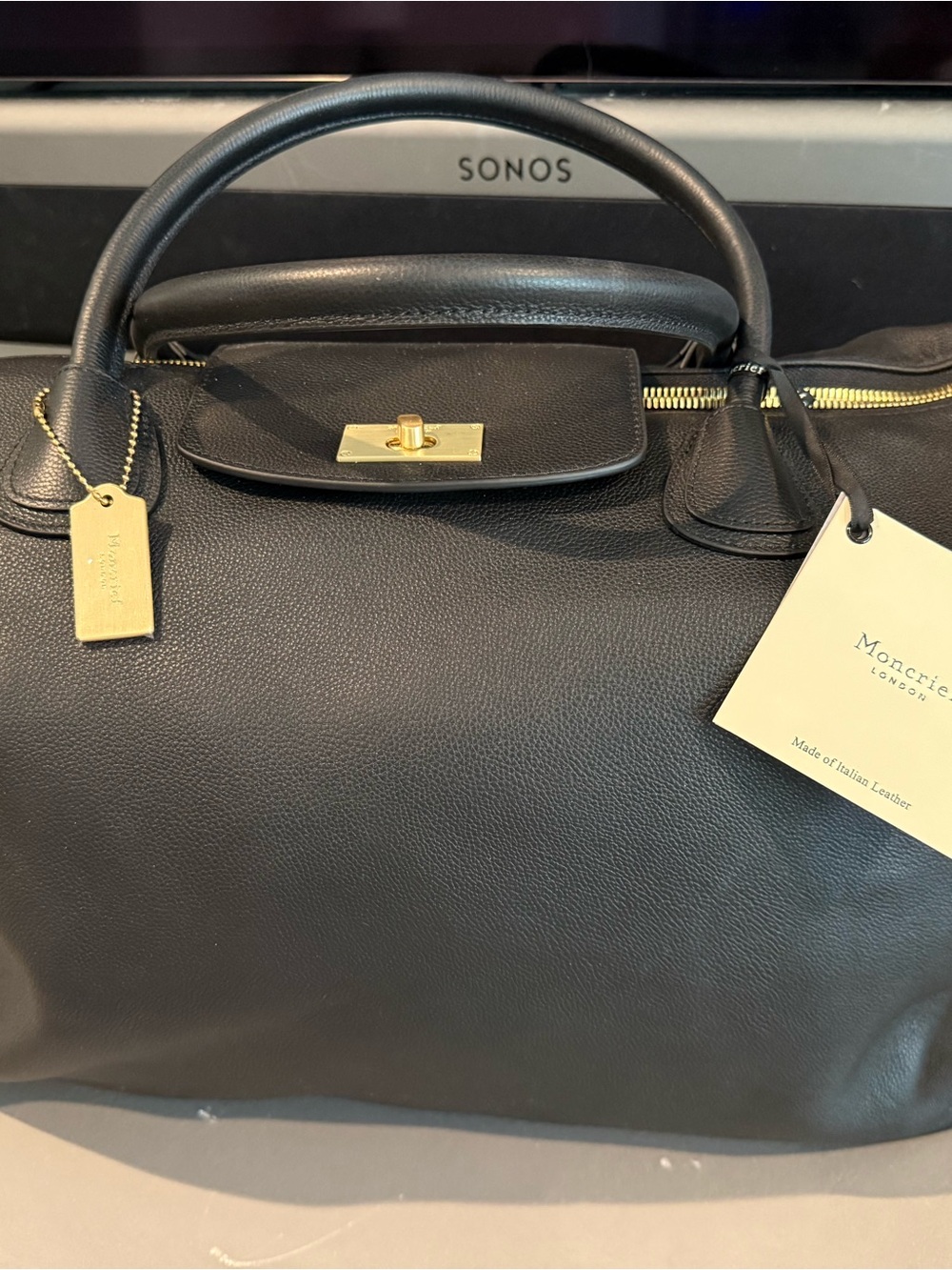 Black Leather Travel Bag with Gold Hardware
